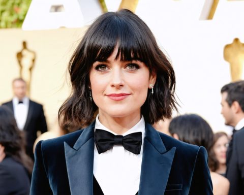 Zooey Deschanel Sparks Reunion Buzz with Tuxedo Glamour at SAG Awards